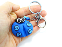 Porte-clés géant coccinelle bleu